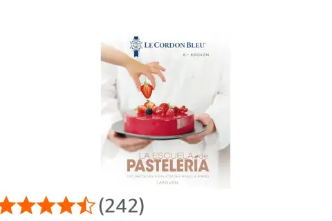Libro "La Escuela de Pastelería" de Le Cordon Bleu, ideal para tu carrera de reposteria. Muestra un pastel decorado con fresas.