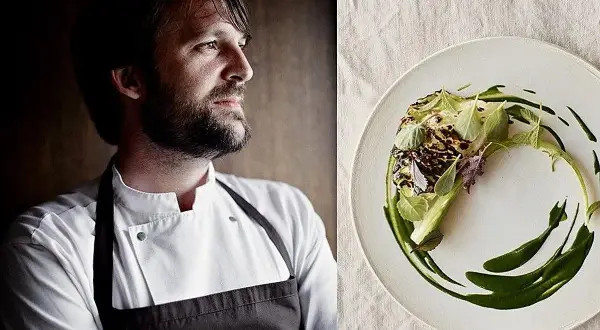 El chef con barba, posible mejor cocinero del mundo, mira a un lado de un plato con un delicado plato de verduras y salsa verde.