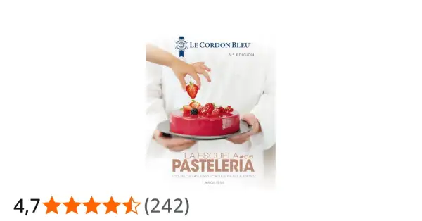 Libro "La Escuela de Pastelería" de Le Cordon Bleu, ideal para tu carrera de reposteria. Muestra un pastel decorado con fresas.